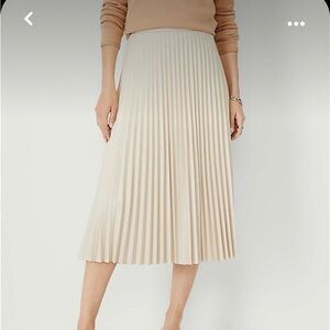 Cream pleated skirt. A New Day size small